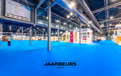 big event hall Jaarbeurs Utrecht with aqua blue sustainable carpet flooring